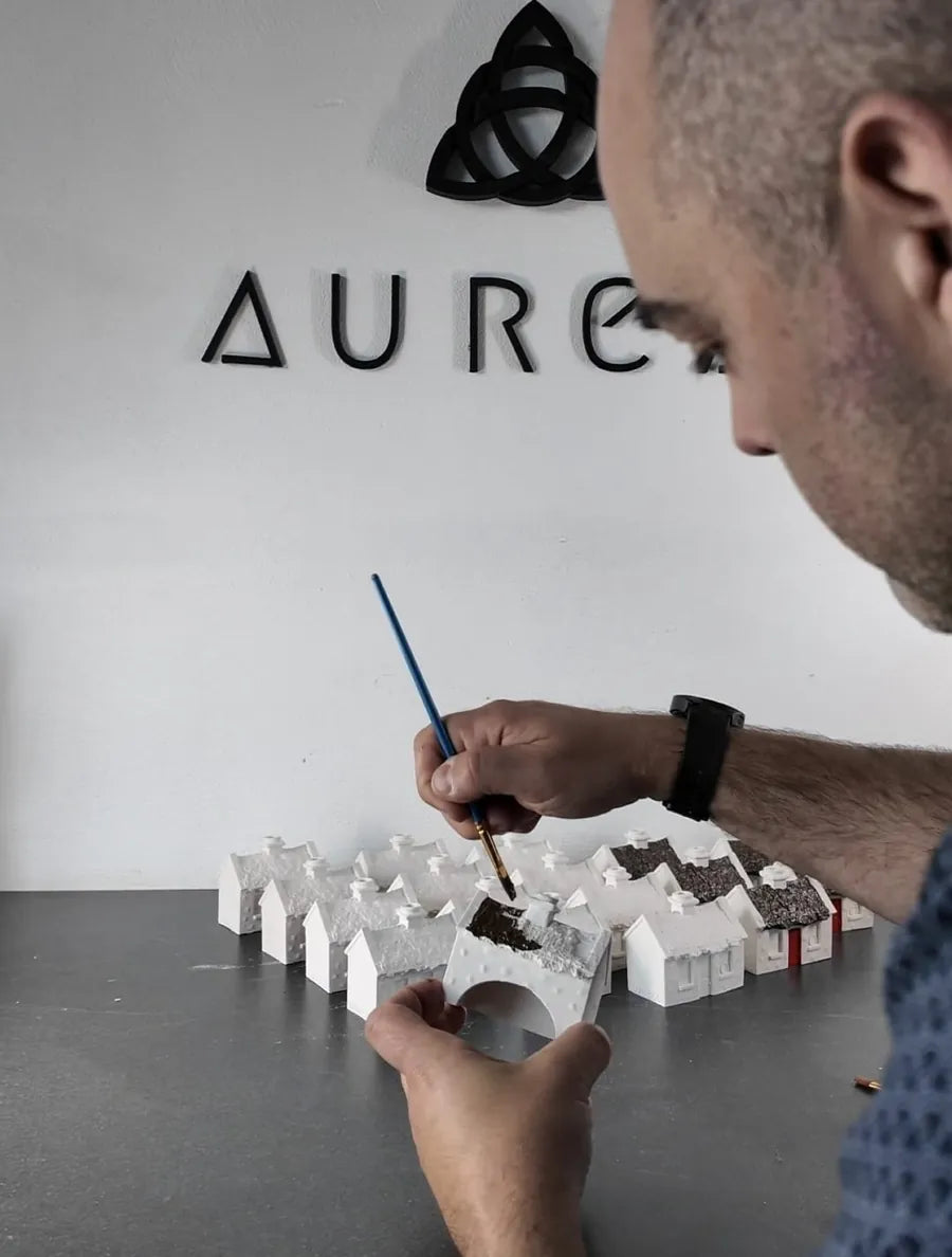 Hand-painting a turf incense cottage at the Aureal workshop