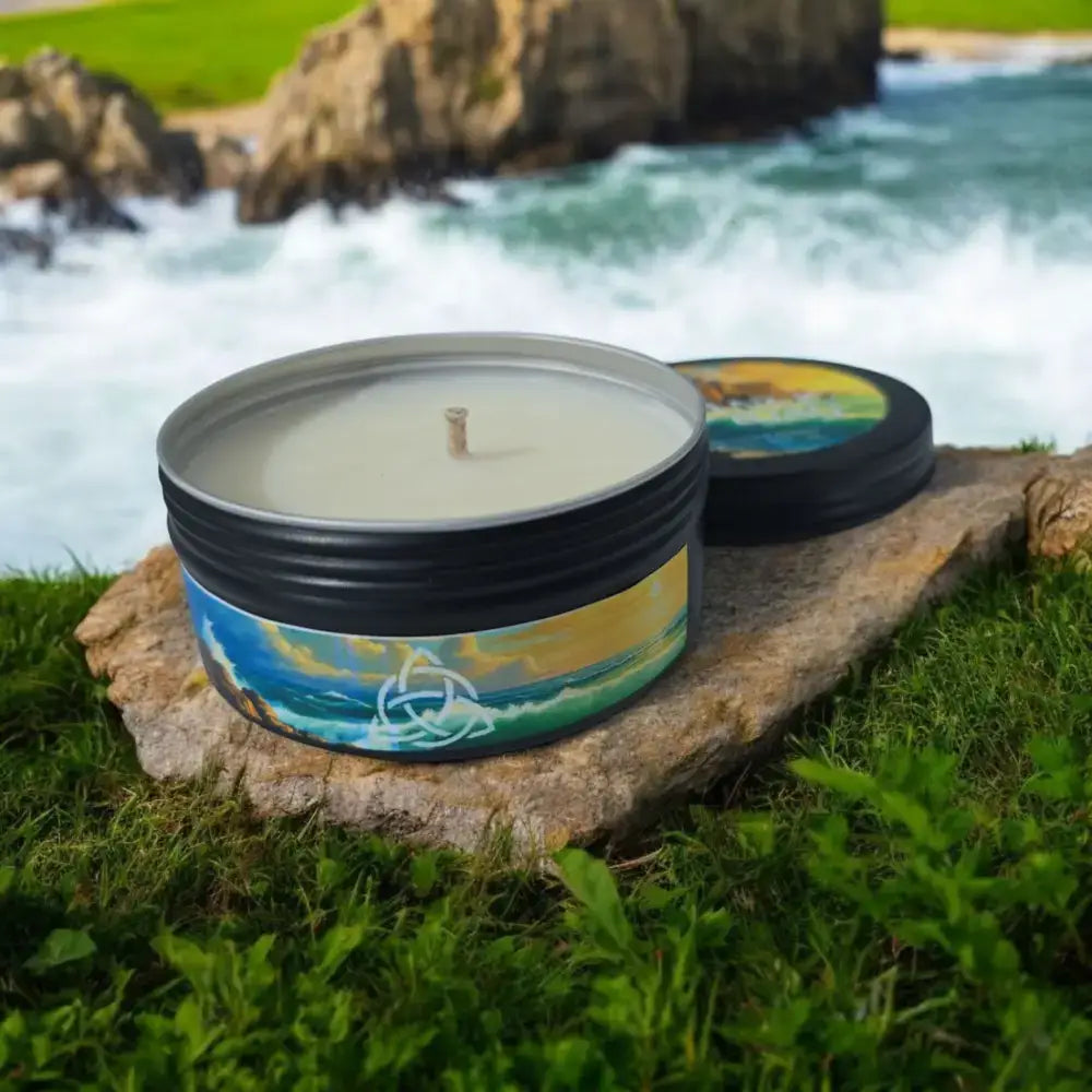 candle beside splashing coastline