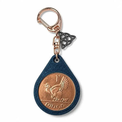 Irish penny with a hen design in a blue teardrop keyring with a rose gold clip and Celtic knot charm