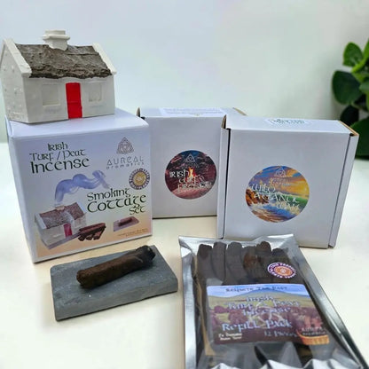 Cottage set box and burner, two candle boxes, a turf sod on a slate and a Refill Pack